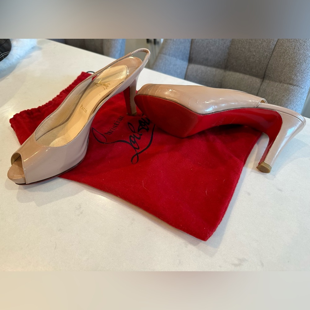 Christian Louboutin peek toe platform sling back.